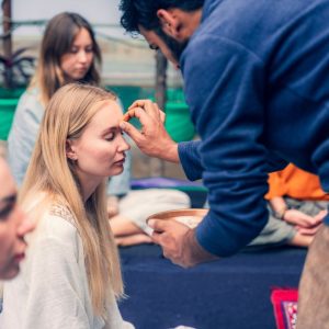 Group meditation and spiritual practice scene with focus on shared rituals and mindfulness.