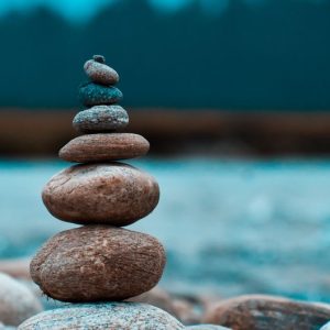 A peaceful arrangement of stacked stones in a natural setting, capturing tranquility in Batabari, India.